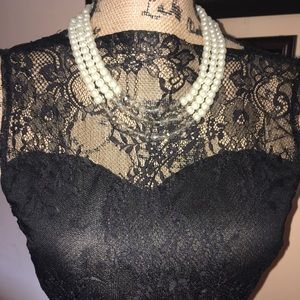 Black lace overlay cocktail dress